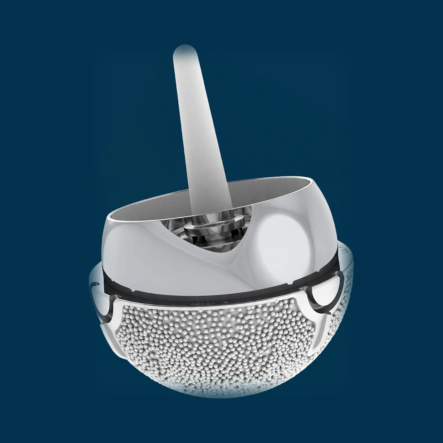 Adept metal-on-metal hip resurfacing implant by MatOrtho, photographed on a navy background