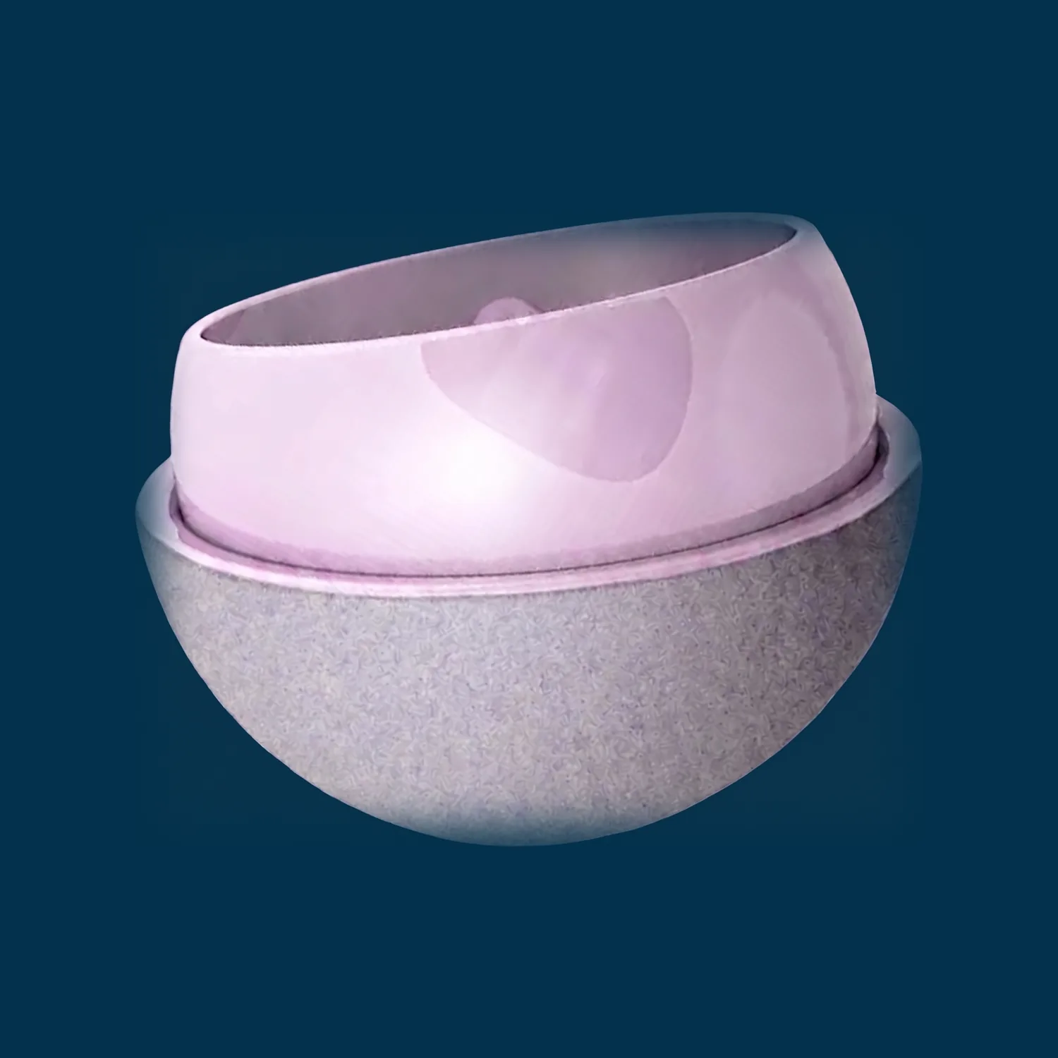 ReCerf ceramic-on-ceramic hip resurfacing implant by MatOrtho, photographed on a navy background