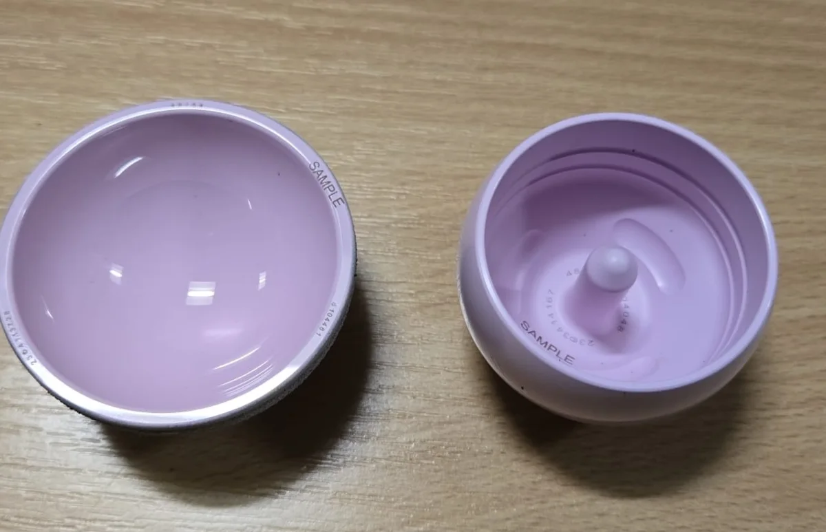 ReCerf ceramic-on-ceramic hip resurfacing implant showing the femoral cap and acetabular cup bearing surfaces, used by Mr Shakir Hussain, Birmingham